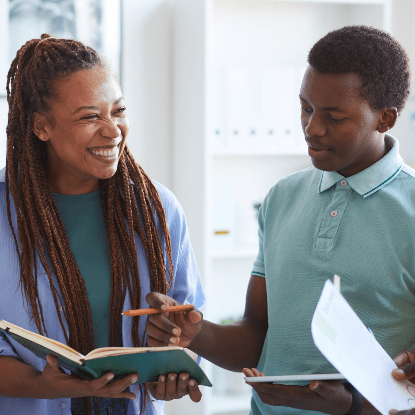 Diverse African students with laptops